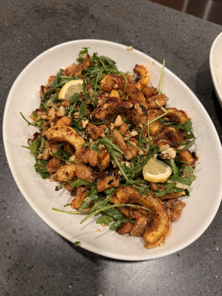Roasted delicata squash salad served family style